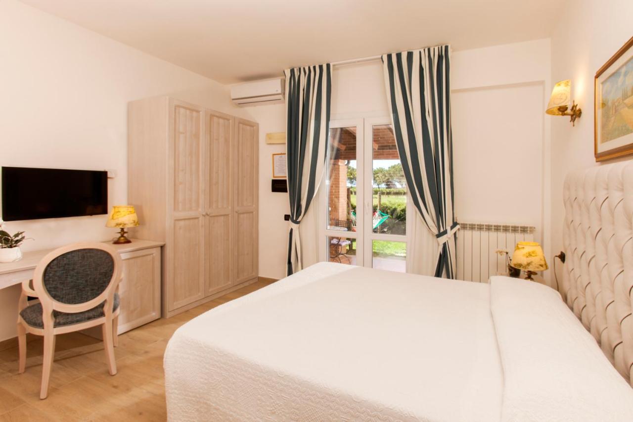 Fattoria Maremmana Aparthotel มารีนาดีกรอซเซโต ภายนอก รูปภาพ