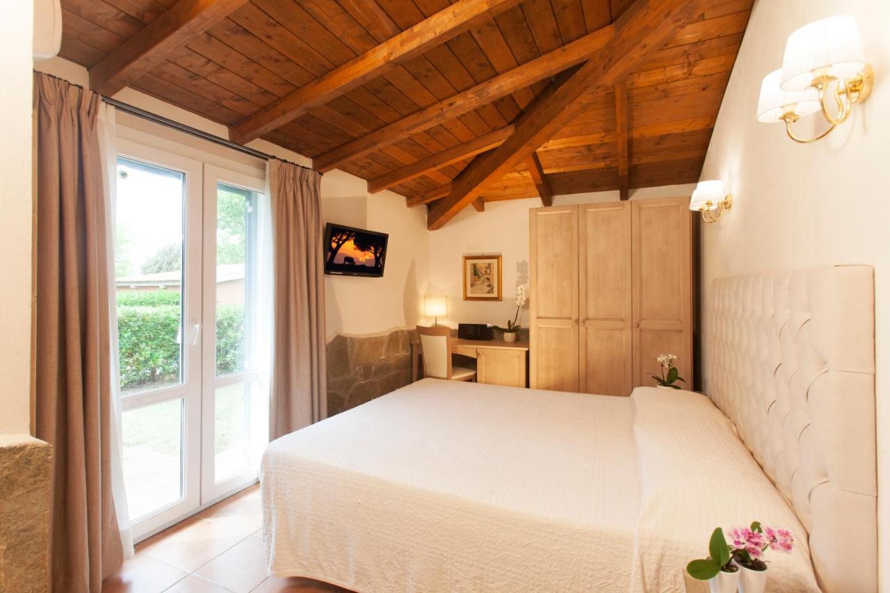 Fattoria Maremmana Aparthotel มารีนาดีกรอซเซโต ภายนอก รูปภาพ