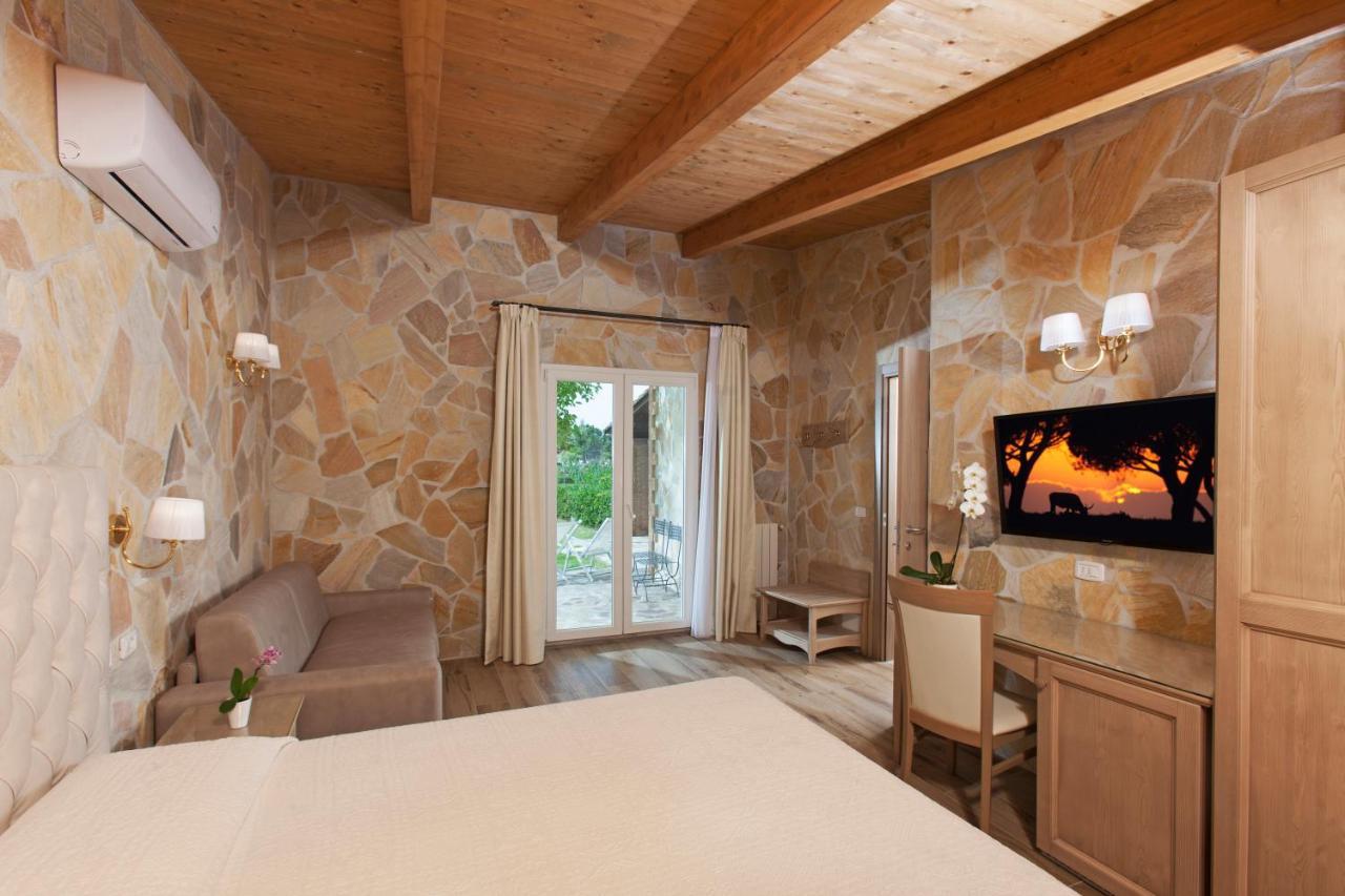 Fattoria Maremmana Aparthotel มารีนาดีกรอซเซโต ภายนอก รูปภาพ